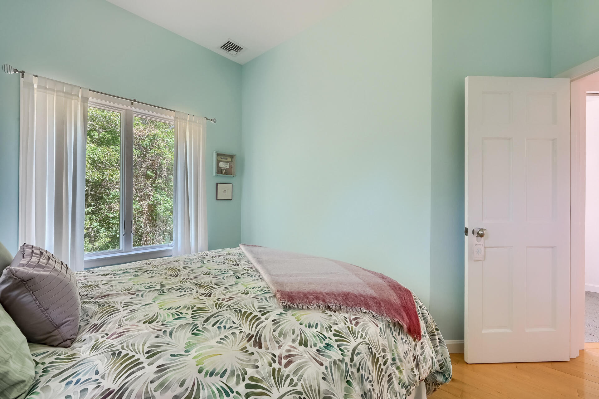 95 Chequessett Neck Road Wellfleet, MA 02667 - Photo 46 of 75 a bedroom with a bed and a window