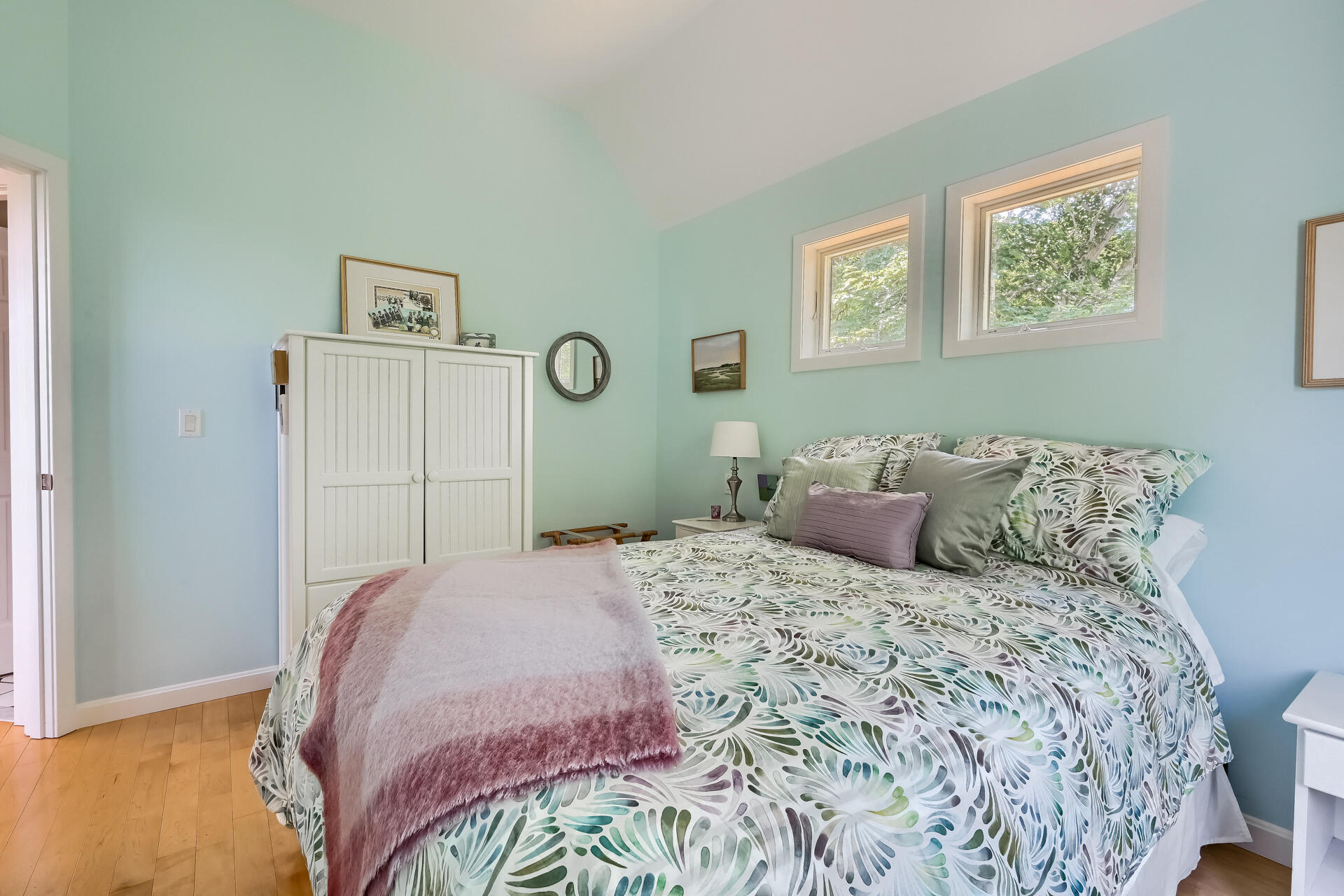 95 Chequessett Neck Road Wellfleet, MA 02667 - Photo 47 of 75 a bedroom with a large bed and a window
