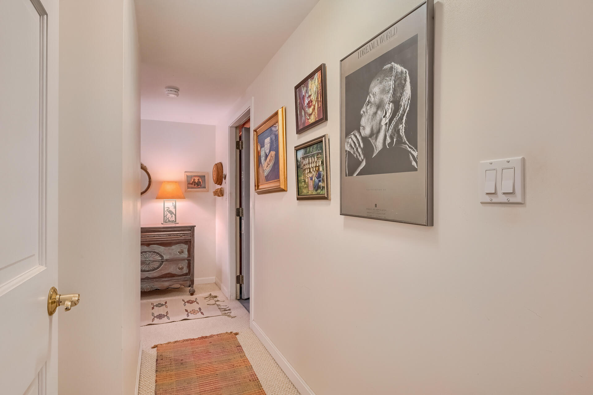 95 Chequessett Neck Road Wellfleet, MA 02667 - Photo 53 of 75 a view of a hallway to rooms and stairs