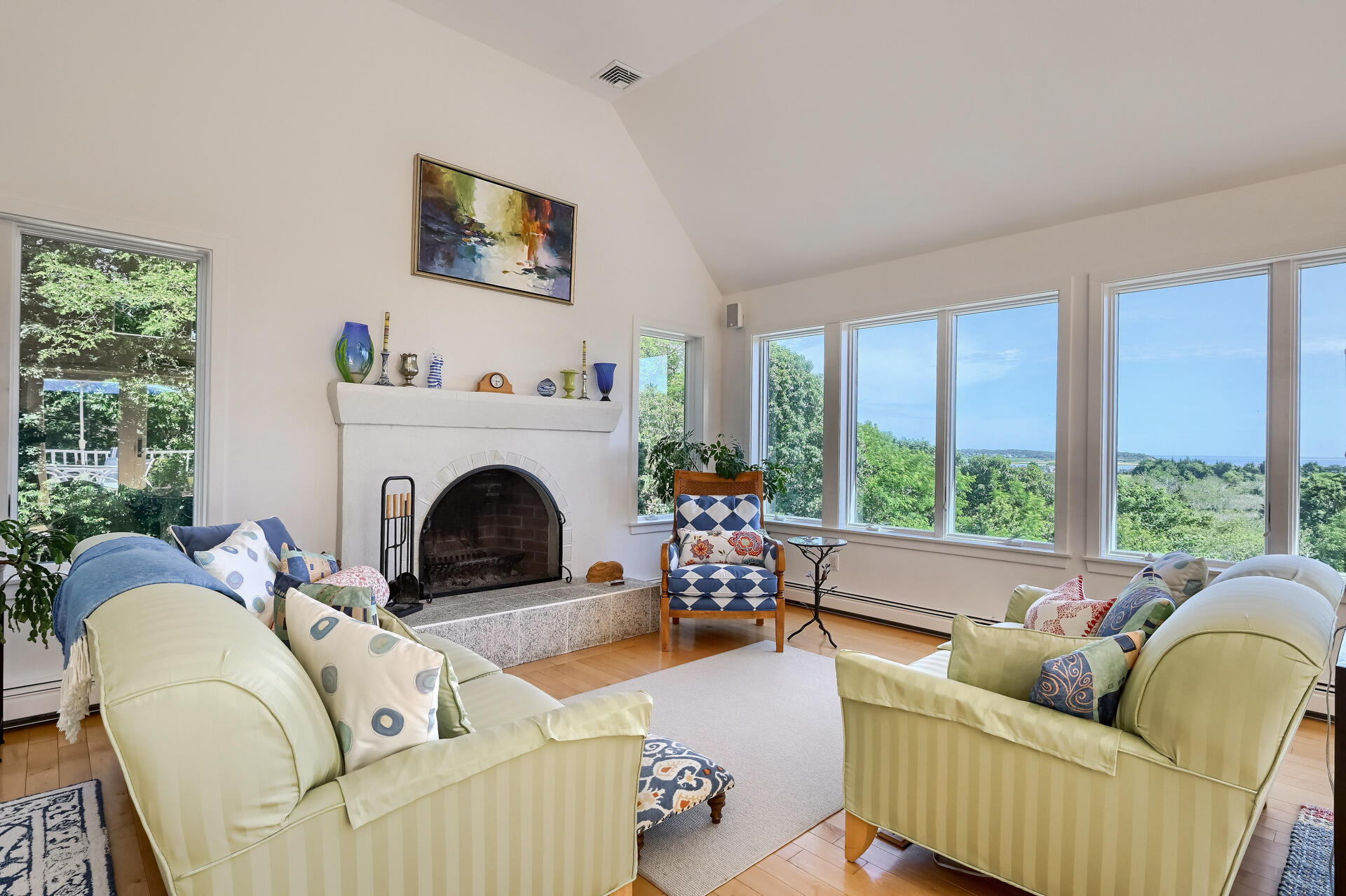 95 Chequessett Neck Road Wellfleet, MA 02667 - Photo 7 of 75 a living room with furniture and a fireplace