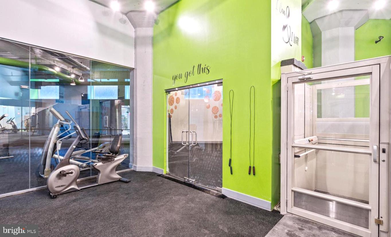 1100 South Broad Street, Unit 309B Philadelphia, PA 19146 - Photo 22 of 34 a view of a room with gym equipment