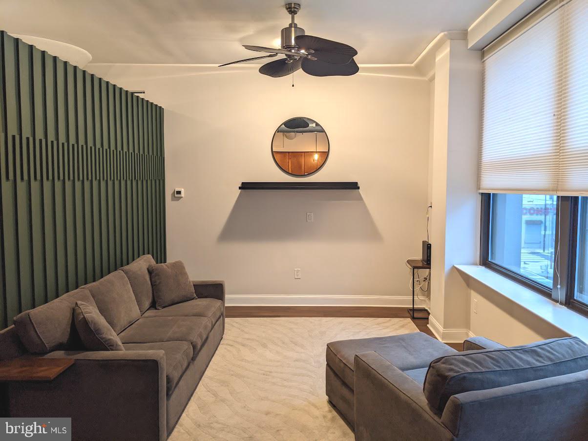 1100 South Broad Street, Unit 309B Philadelphia, PA 19146 - Photo 6 of 34 a living room with furniture