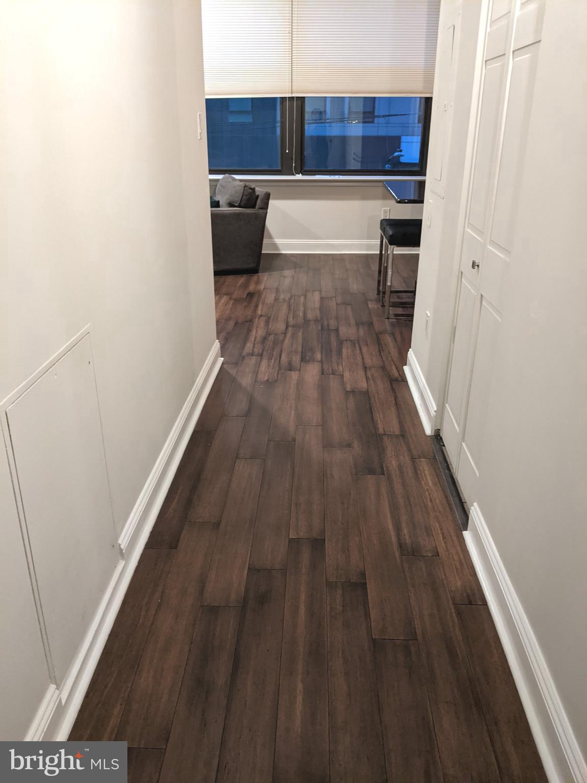1100 South Broad Street, Unit 309B Philadelphia, PA 19146 - Photo 9 of 34 a view of kitchen with wooden floor