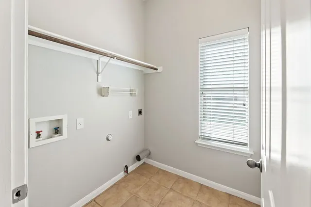 a view of a small space with a window and a bathroom