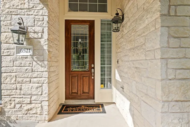 front view of a brick house with a door