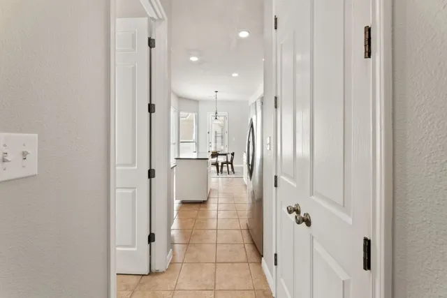 a bathroom with a glass door shower