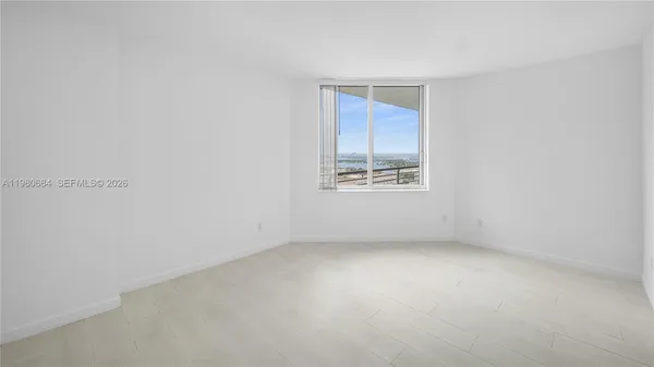 a view of a room with a window