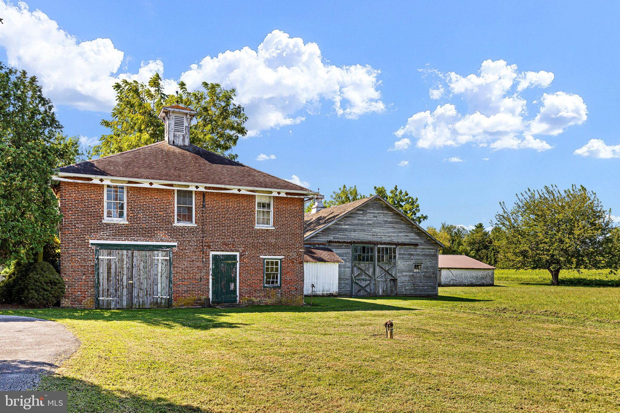 692 Bayview Road Middletown, DE 19709 - Photo 13 of 45 a front view of a house with a yard