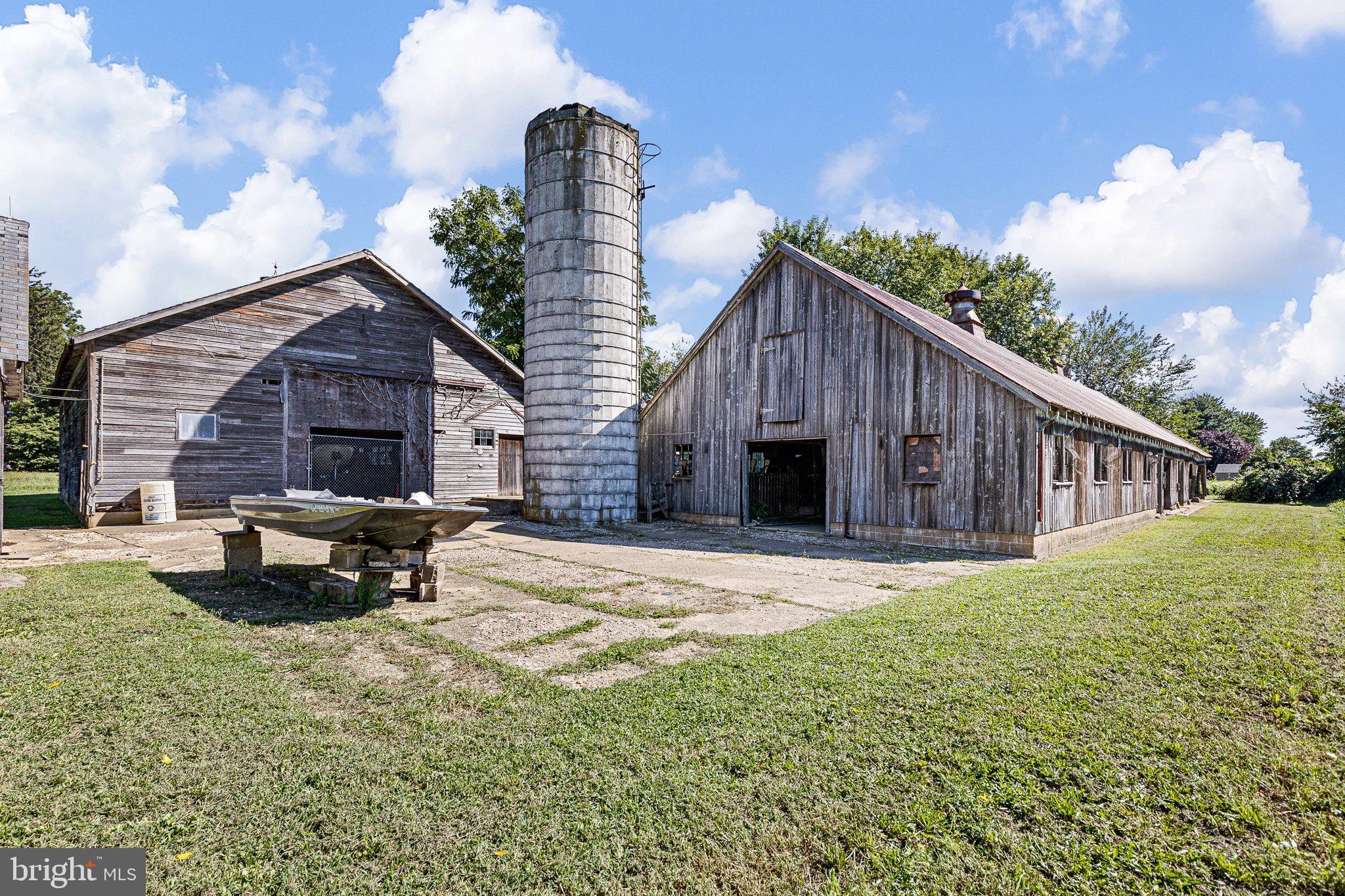 692 Bayview Road Middletown, DE 19709 - Photo 18 of 45 a brick house with garden in front of it