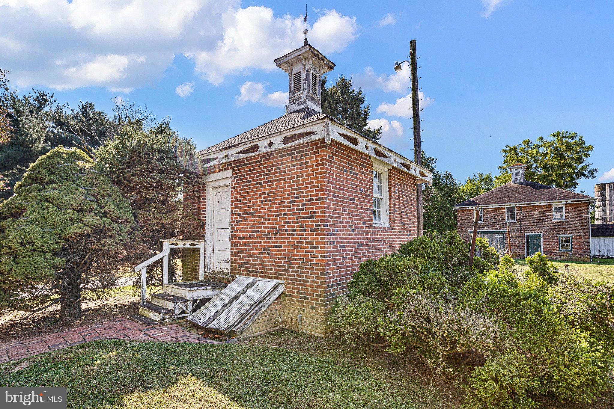 692 Bayview Road Middletown, DE 19709 - Photo 23 of 45 a front view of a house with garden