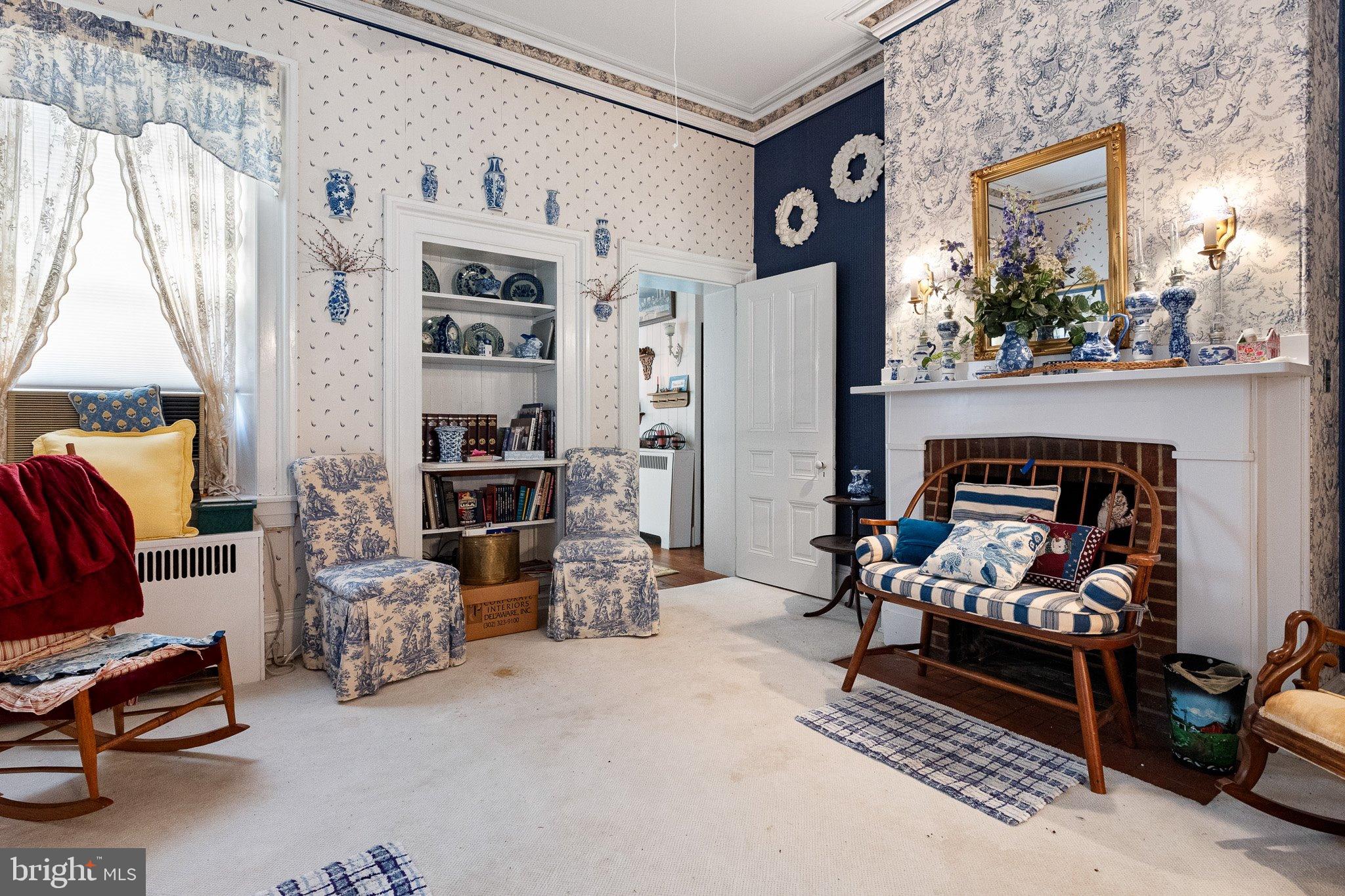 692 Bayview Road Middletown, DE 19709 - Photo 29 of 45 a living room with furniture and a fireplace