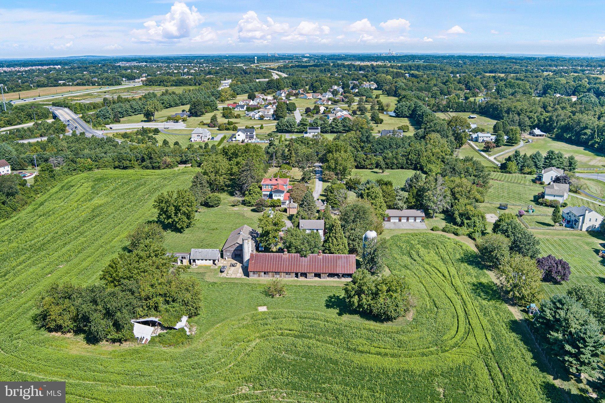 692 Bayview Road Middletown, DE 19709 - Photo 7 of 45 an aerial view of residential houses with outdoor space and trees