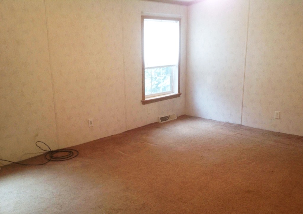 5 Medallion Road Holbrook, MA 02343 - Photo 6 of 10 an empty room with a window