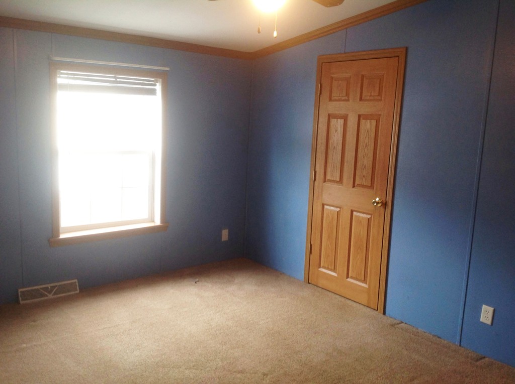 5 Medallion Road Holbrook, MA 02343 - Photo 8 of 10 an empty room with windows