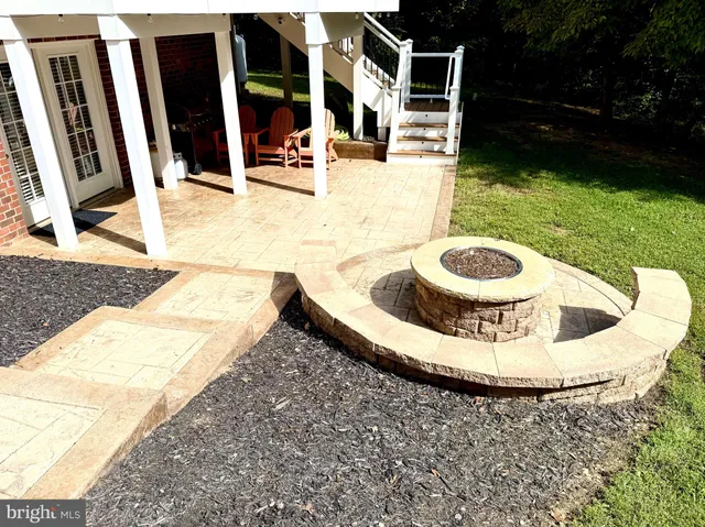 a view of swimming pool with seating space