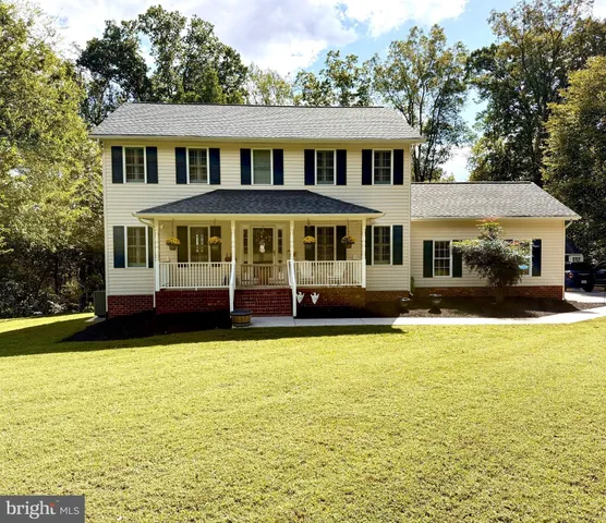 a front view of a house with swimming pool