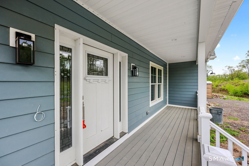 8 Ridgewood Club Road Prospect, CT 06712 - Photo 4 of 40 a view of a house with a deck