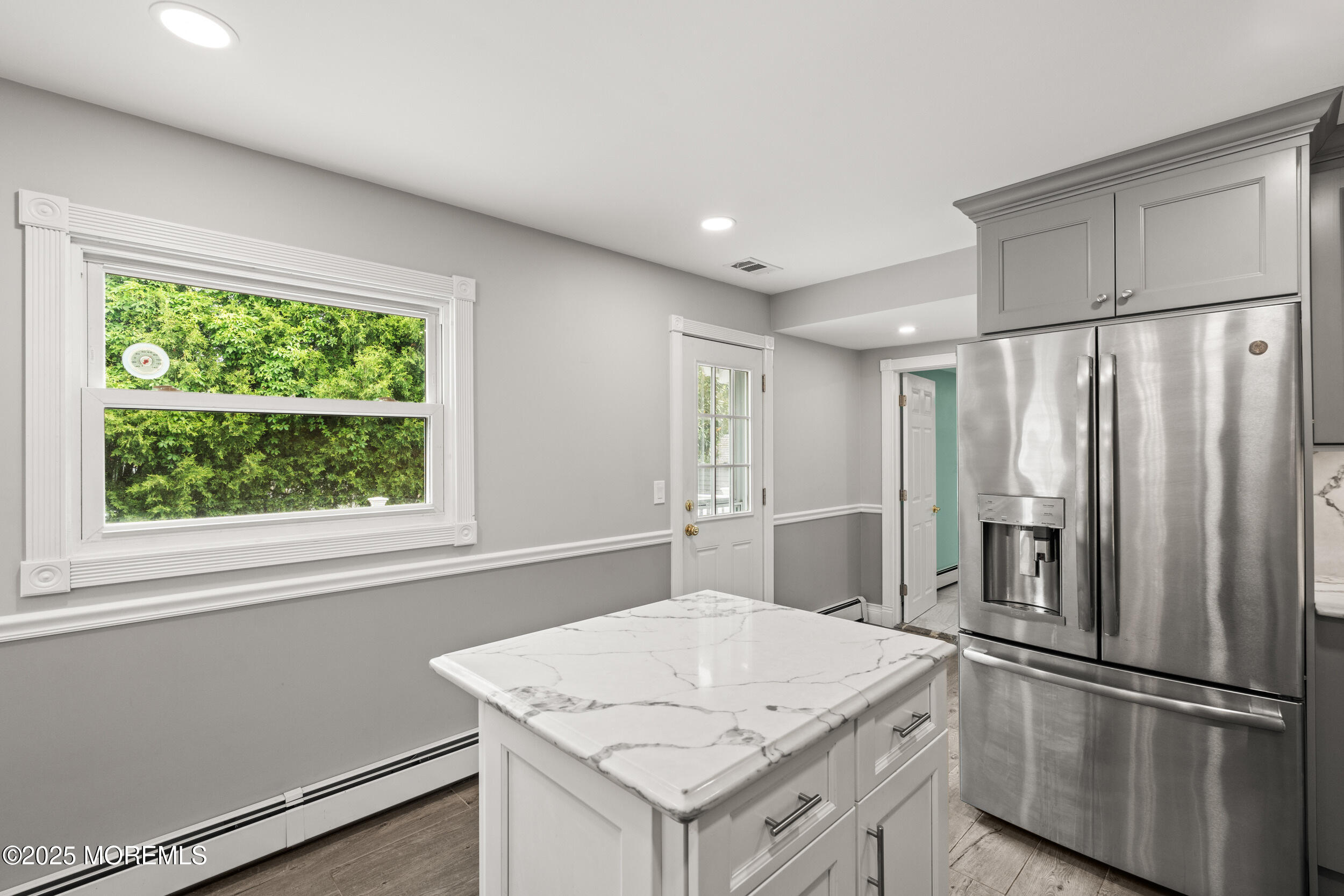 351 Hollywood Avenue Long Branch, NJ 07740 - Photo 12 of 34 a kitchen with stainless steel appliances granite countertop a refrigerator a sink and a stove