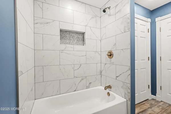 a bathroom with a bathtub