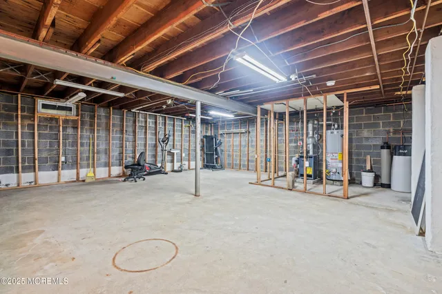 a view of a room with wooden ceiling