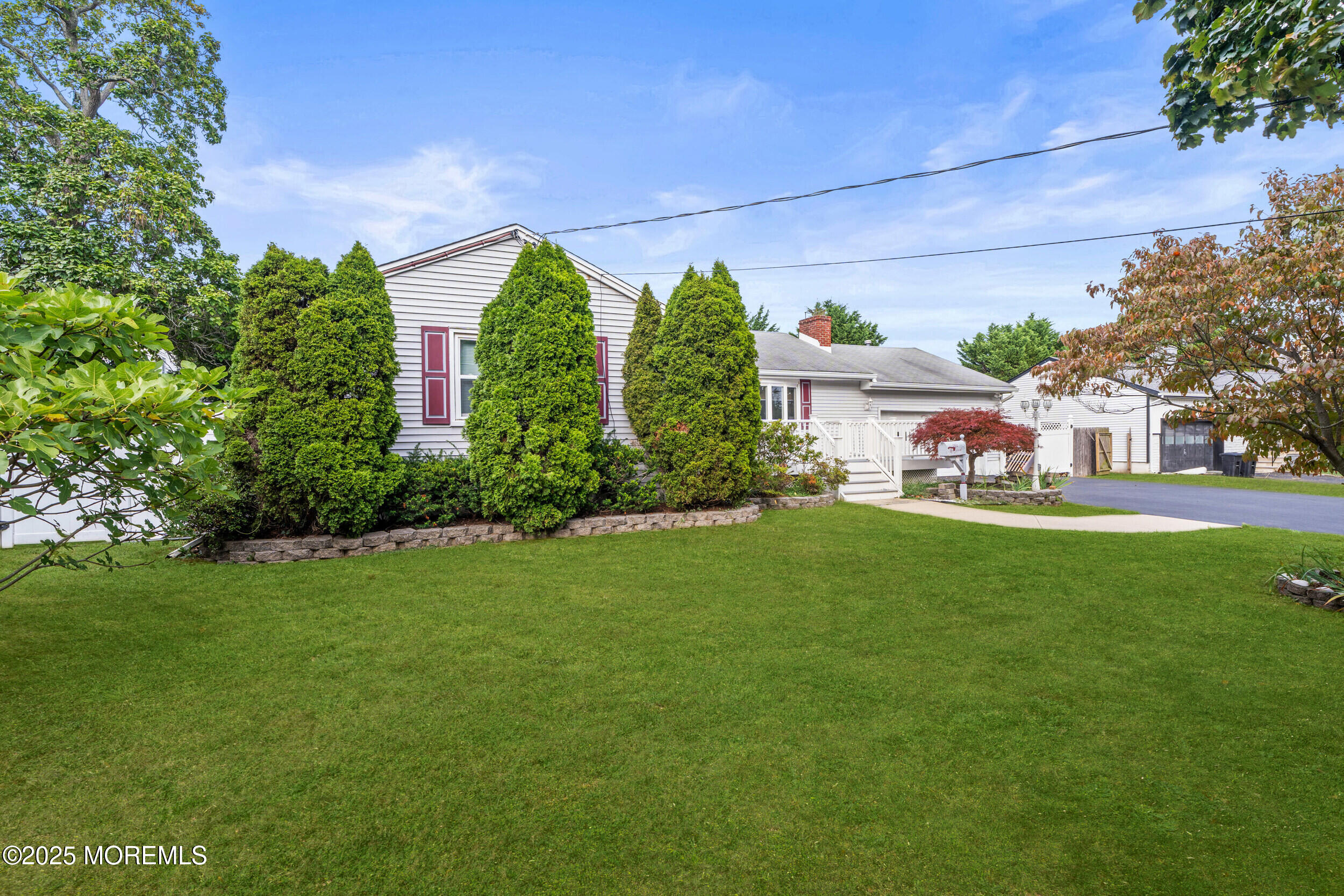 351 Hollywood Avenue Long Branch, NJ 07740 - Photo 33 of 34 a front view of a house with garden