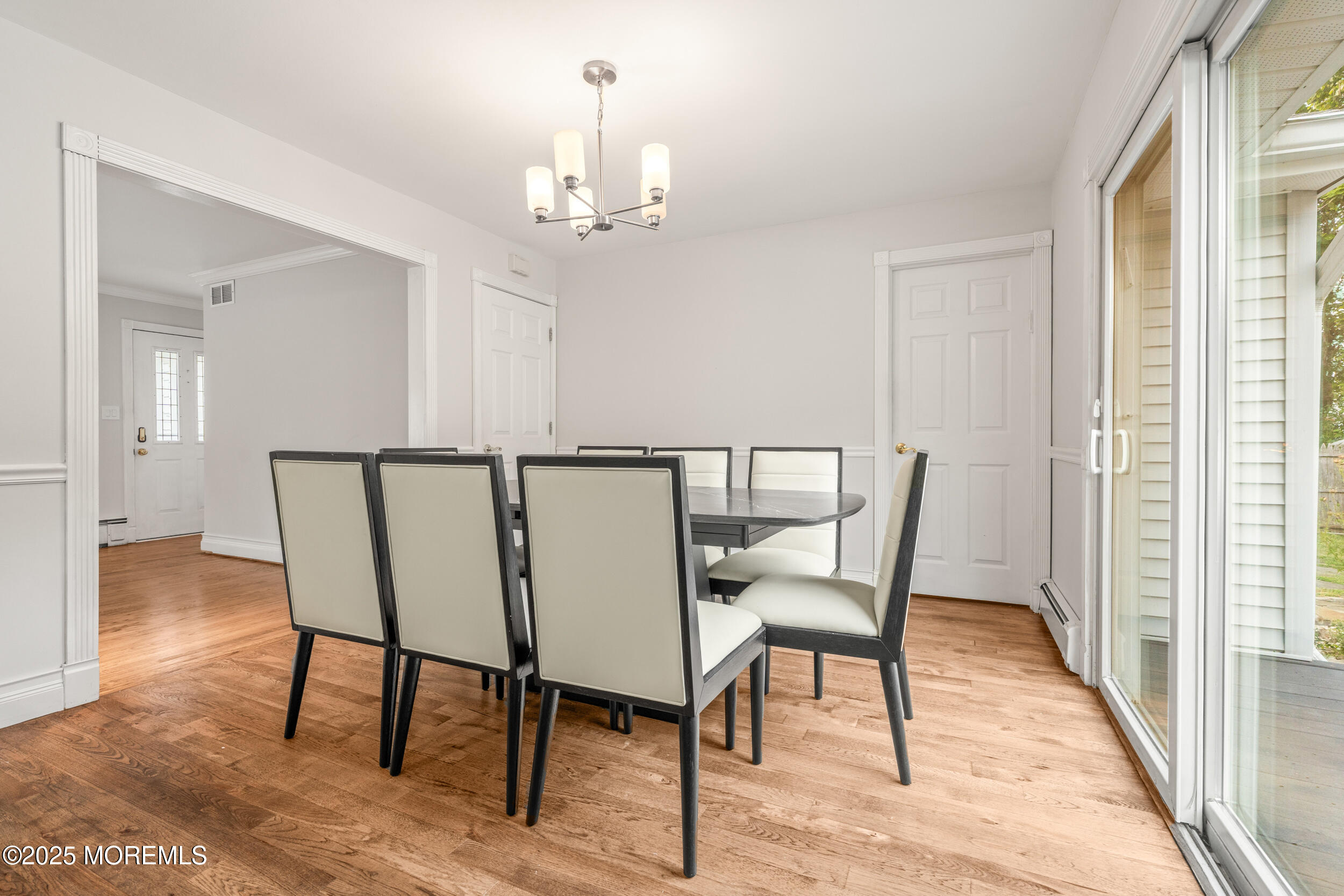 351 Hollywood Avenue Long Branch, NJ 07740 - Photo 6 of 34 a view of a dining room with furniture and wooden floor