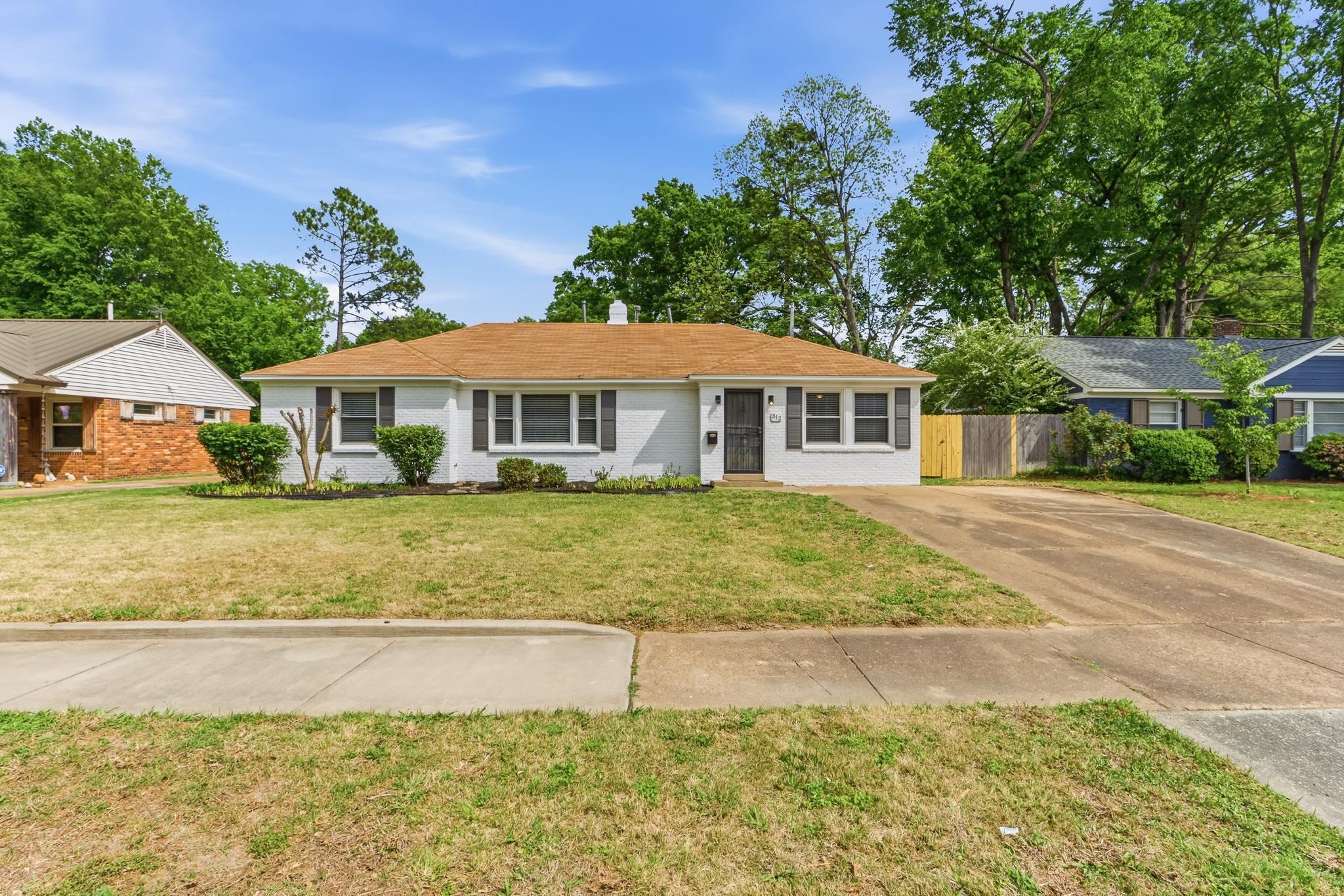 312 Fernway Road Memphis, TN 38117 - Photo 38 of 38 Ranch-style home featuring brick siding and concrete driveway