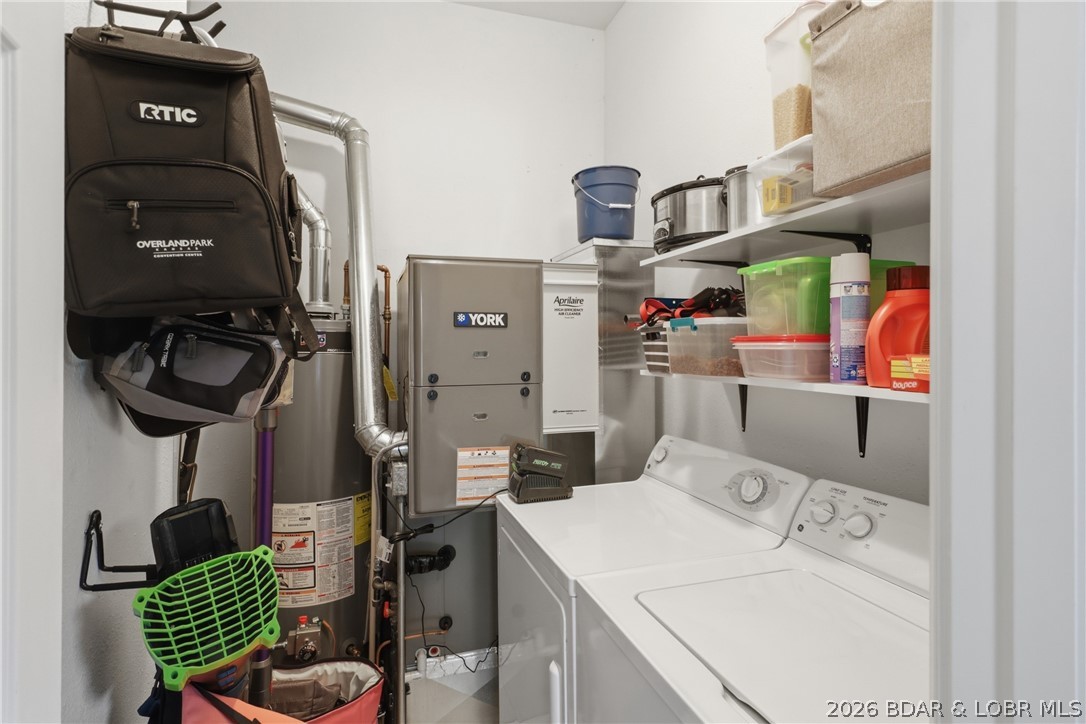 1492 Purvis Road Sunrise Beach, MO 65079 - Photo 21 of 41 Upper-level laundry room. Secondary wash/dryer ho