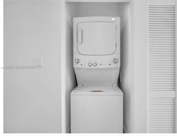 a view of a livingroom with wooden floor