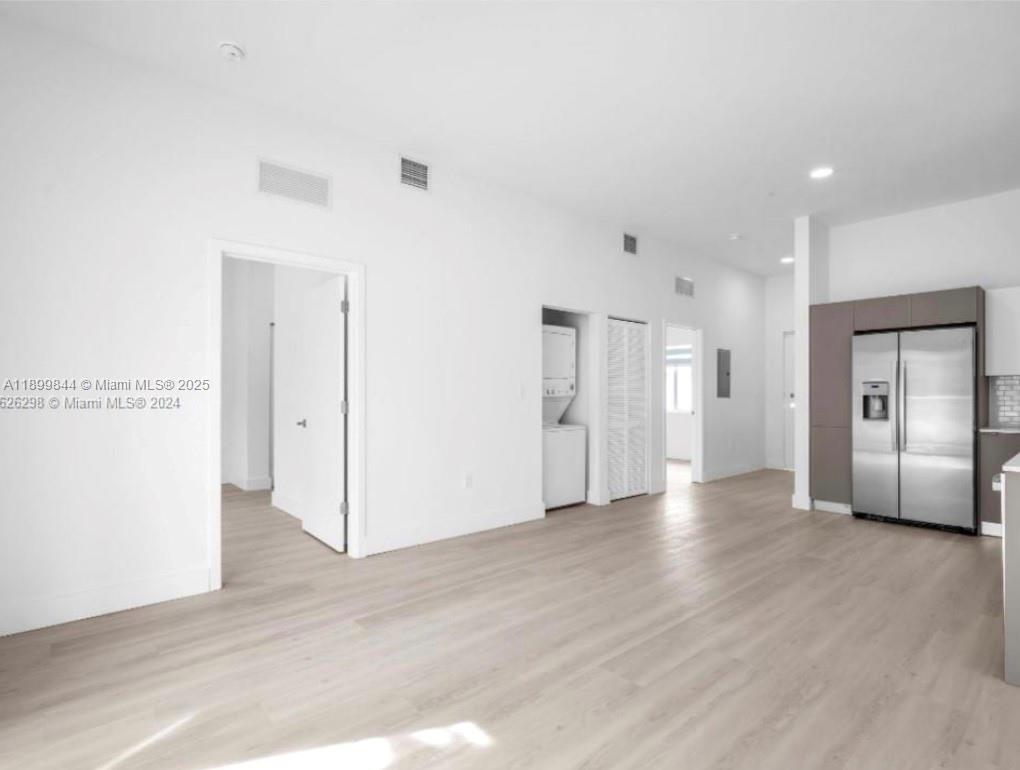 110 Foster Road, Unit 109B Hallandale Beach, FL 33009 - Photo 9 of 12 a view of a livingroom with wooden floor