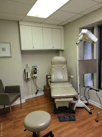 a room with furniture and air hockey table