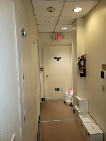 a bathroom with a bathtub and shower