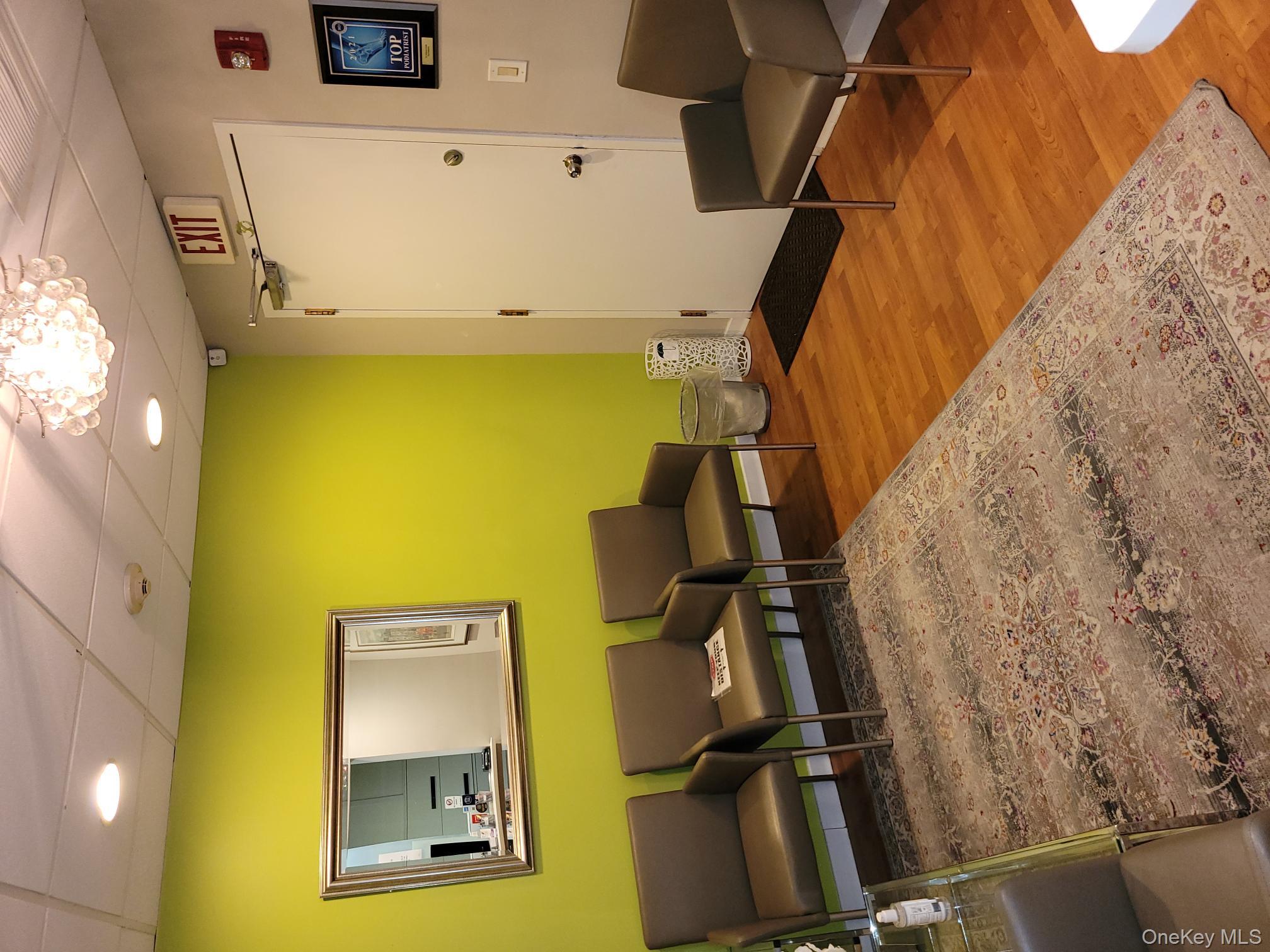 161 Madison Avenue, Unit 7SW Manhattan, NY 10016 - Photo 7 of 21 a living room with furniture and a rug