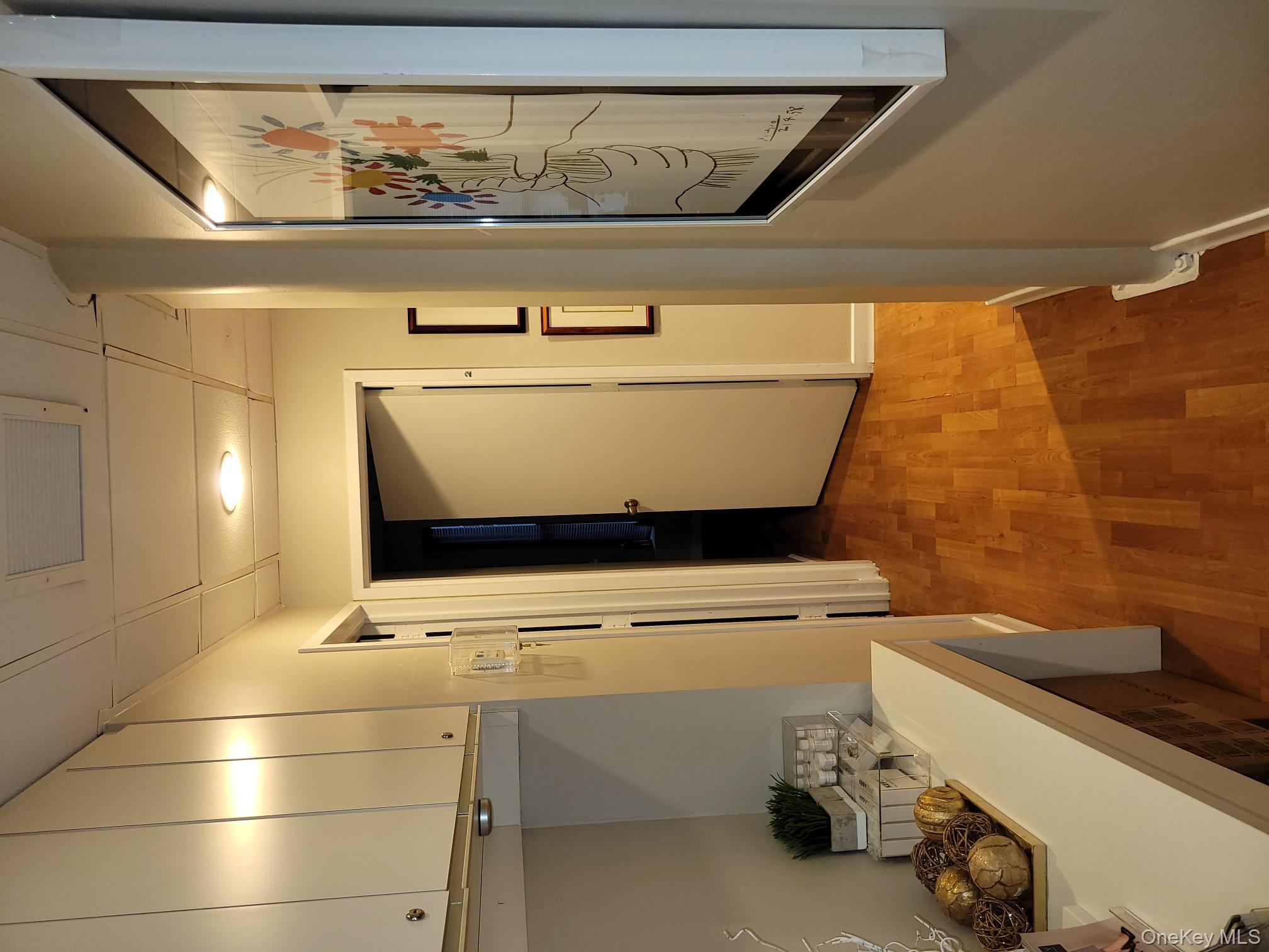 161 Madison Avenue, Unit 7SW Manhattan, NY 10016 - Photo 10 of 21 a bathroom with a sink and a mirror