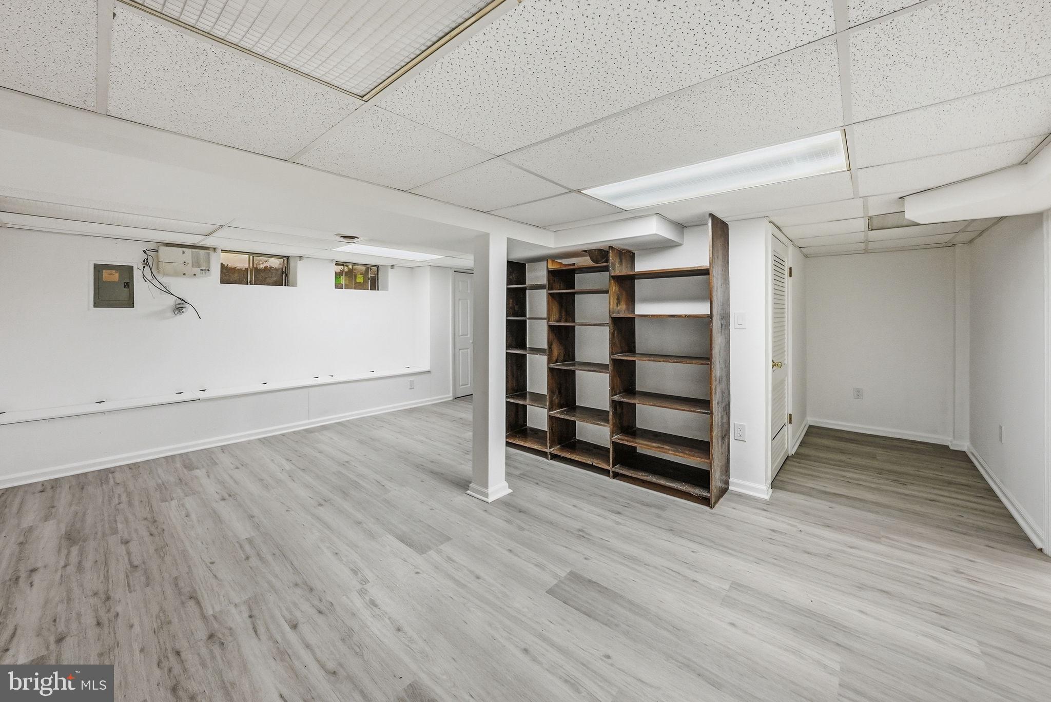371 Bolton Road East Windsor, NJ 08520 - Photo 18 of 20 an empty room with wooden floor and windows