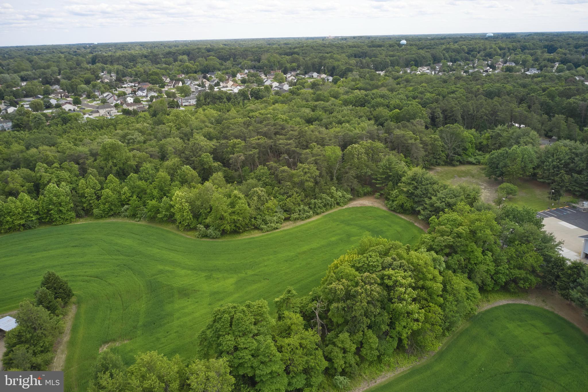 445 Hurffville-Grenloch Road Sewell, NJ 08080 - Photo 8 of 15 a view of a green field with lots of bushes