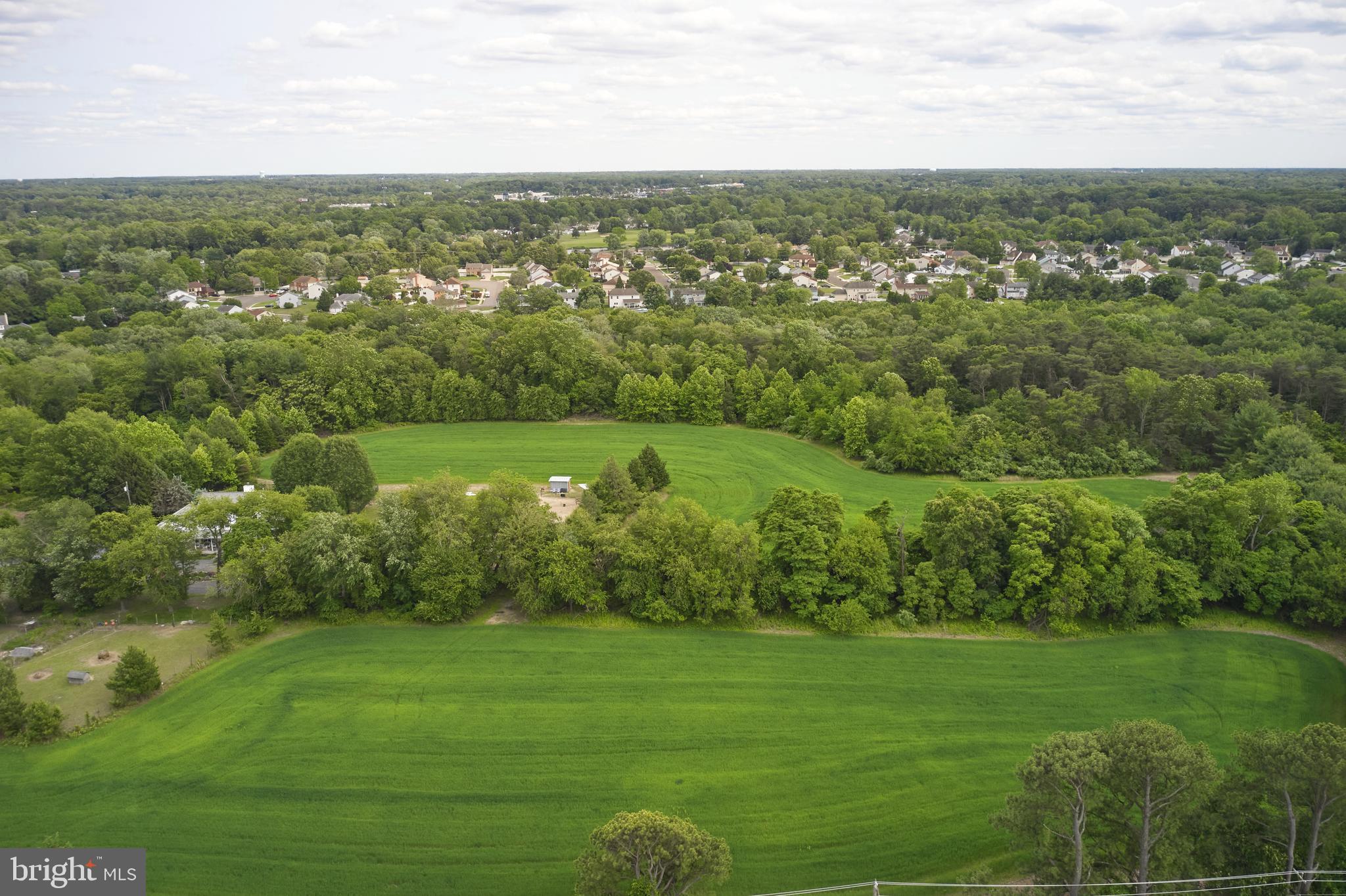 445 Hurffville-Grenloch Road Sewell, NJ 08080 - Photo 9 of 15 a view of a city with lush green forest
