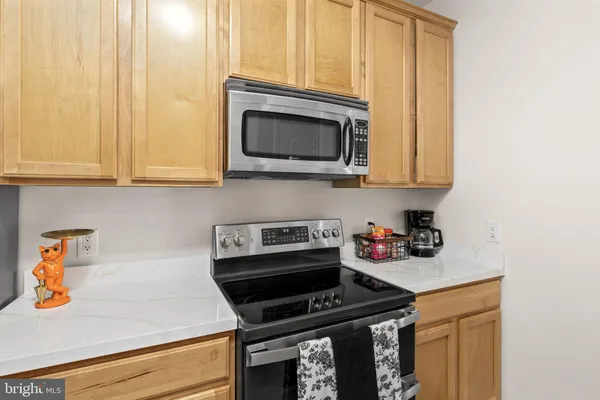 a kitchen with a sink and a window