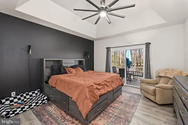 a bedroom with a bed and a closet