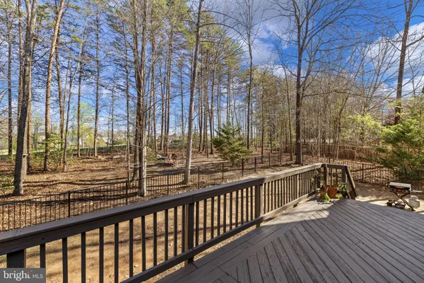 a view of a backyard with sitting area