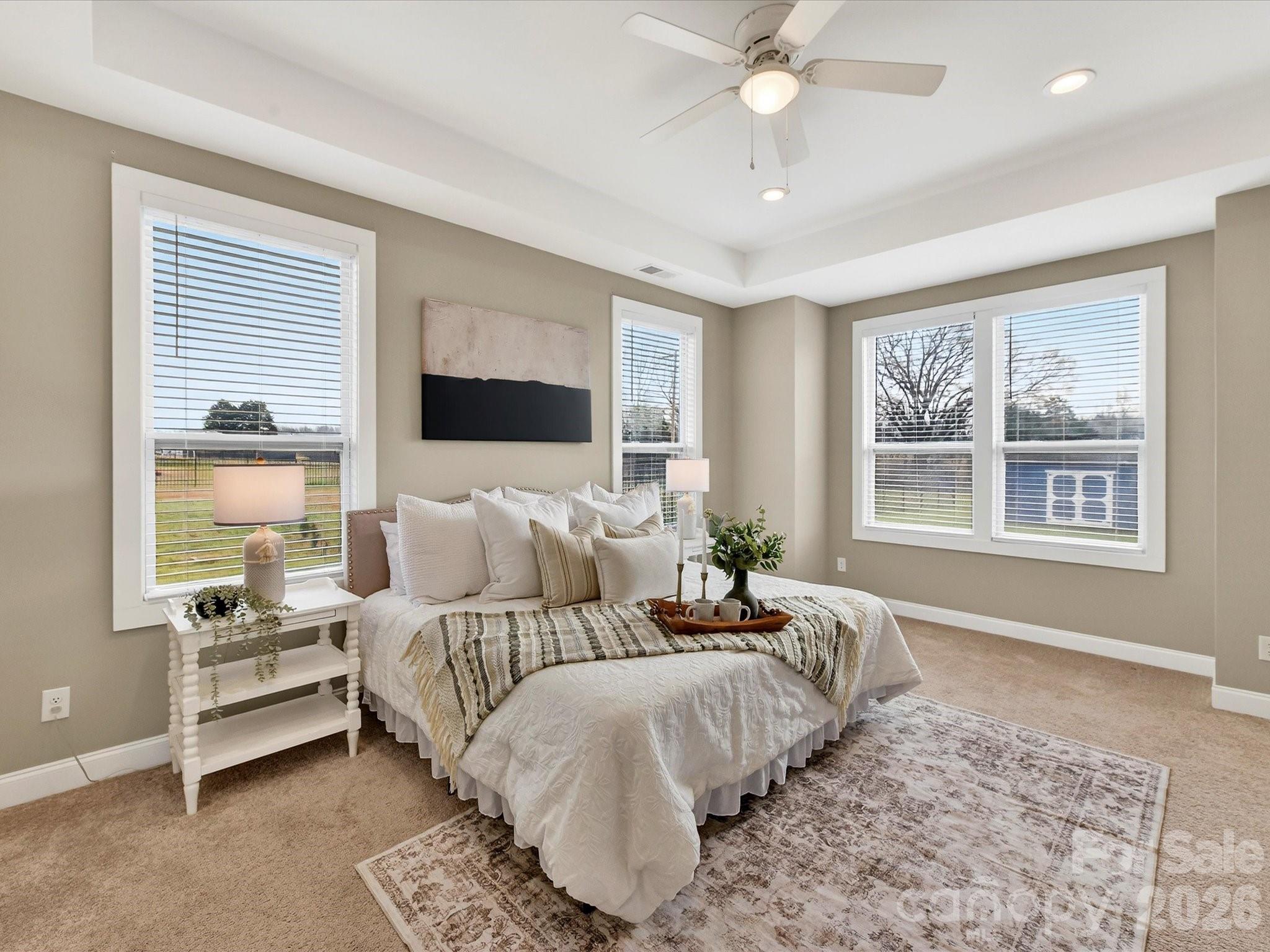 215 Lone Pine Road Statesville, NC 28625 - Photo 14 of 30 a bedroom with a large bed and a window