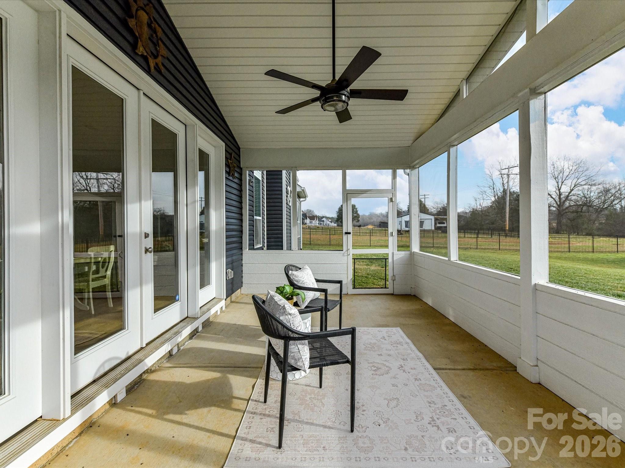 215 Lone Pine Road Statesville, NC 28625 - Photo 27 of 30 a living room with furniture and a large window