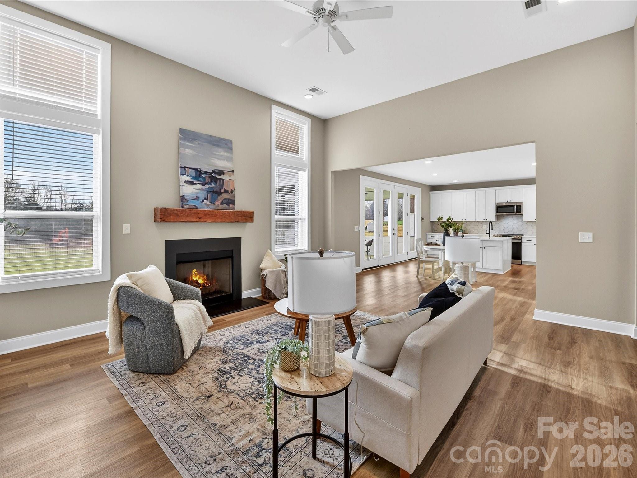 215 Lone Pine Road Statesville, NC 28625 - Photo 6 of 30 a living room with furniture and a fireplace