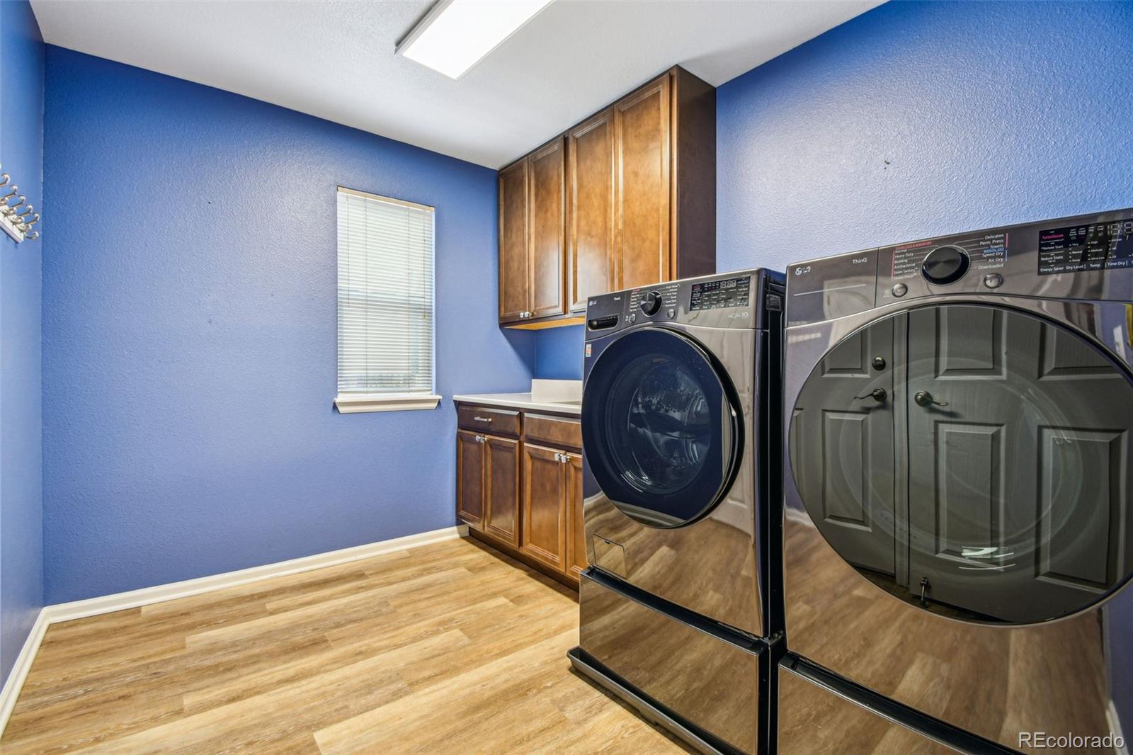 9722 Kipling Street Westminster, CO 80021 - Photo 18 of 45 a utility room with dryer and washer