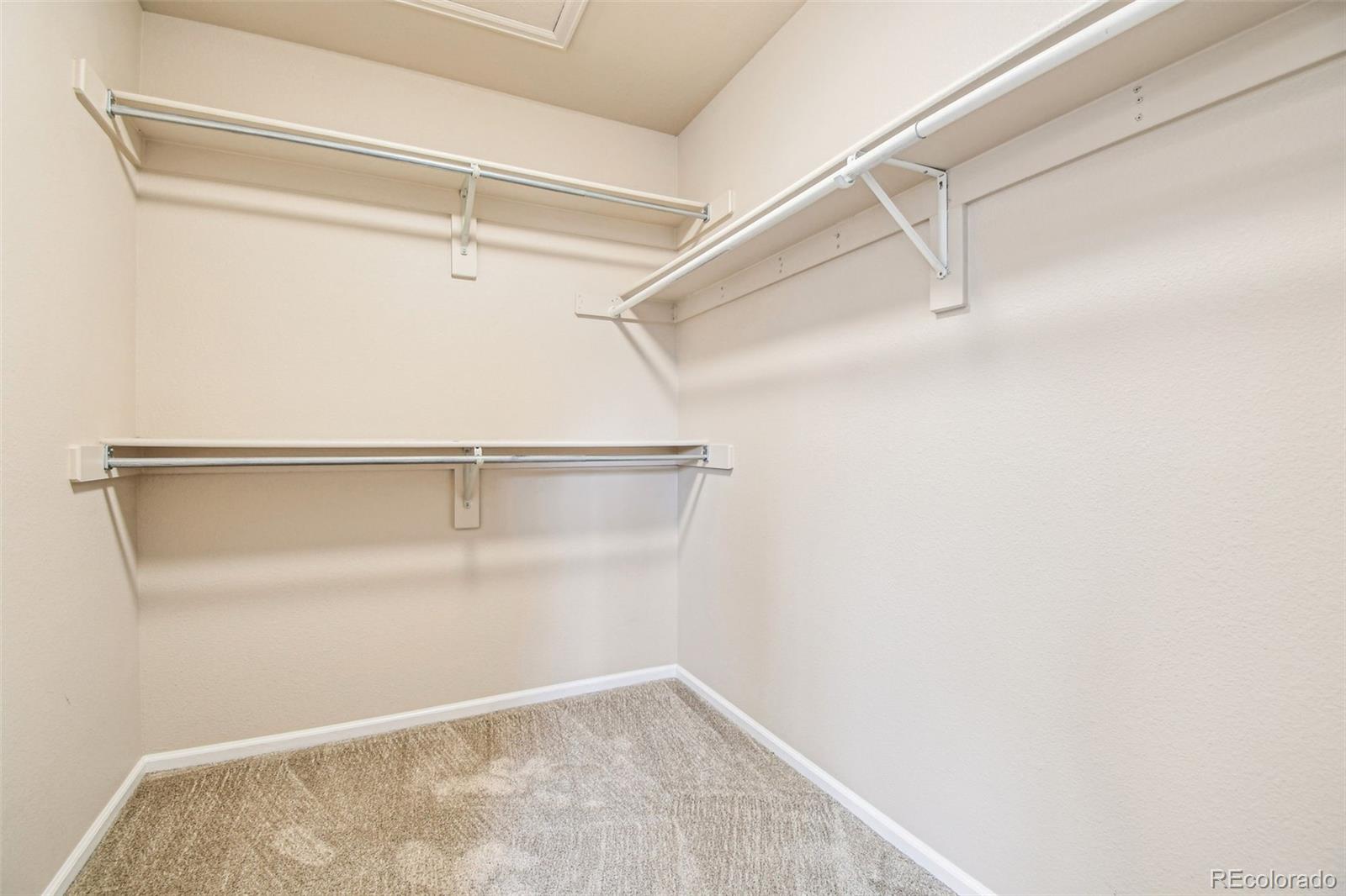 9722 Kipling Street Westminster, CO 80021 - Photo 25 of 45 a view of an empty walk in closet