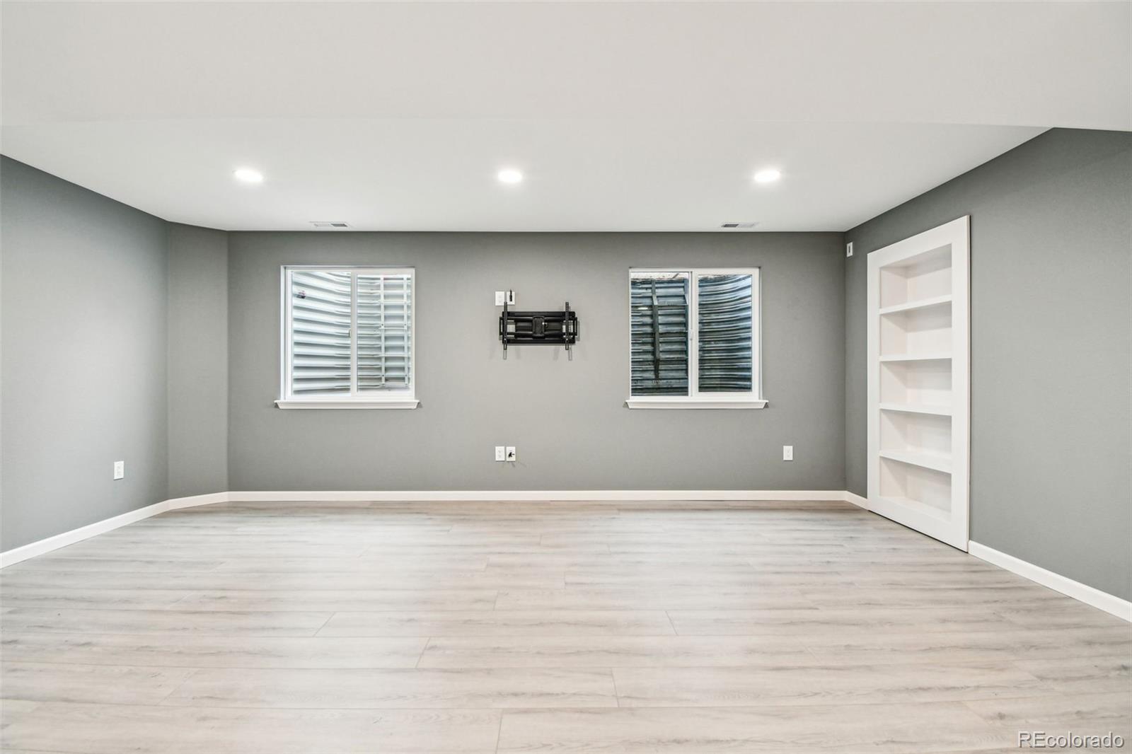9722 Kipling Street Westminster, CO 80021 - Photo 35 of 45 a view of an empty room with a window
