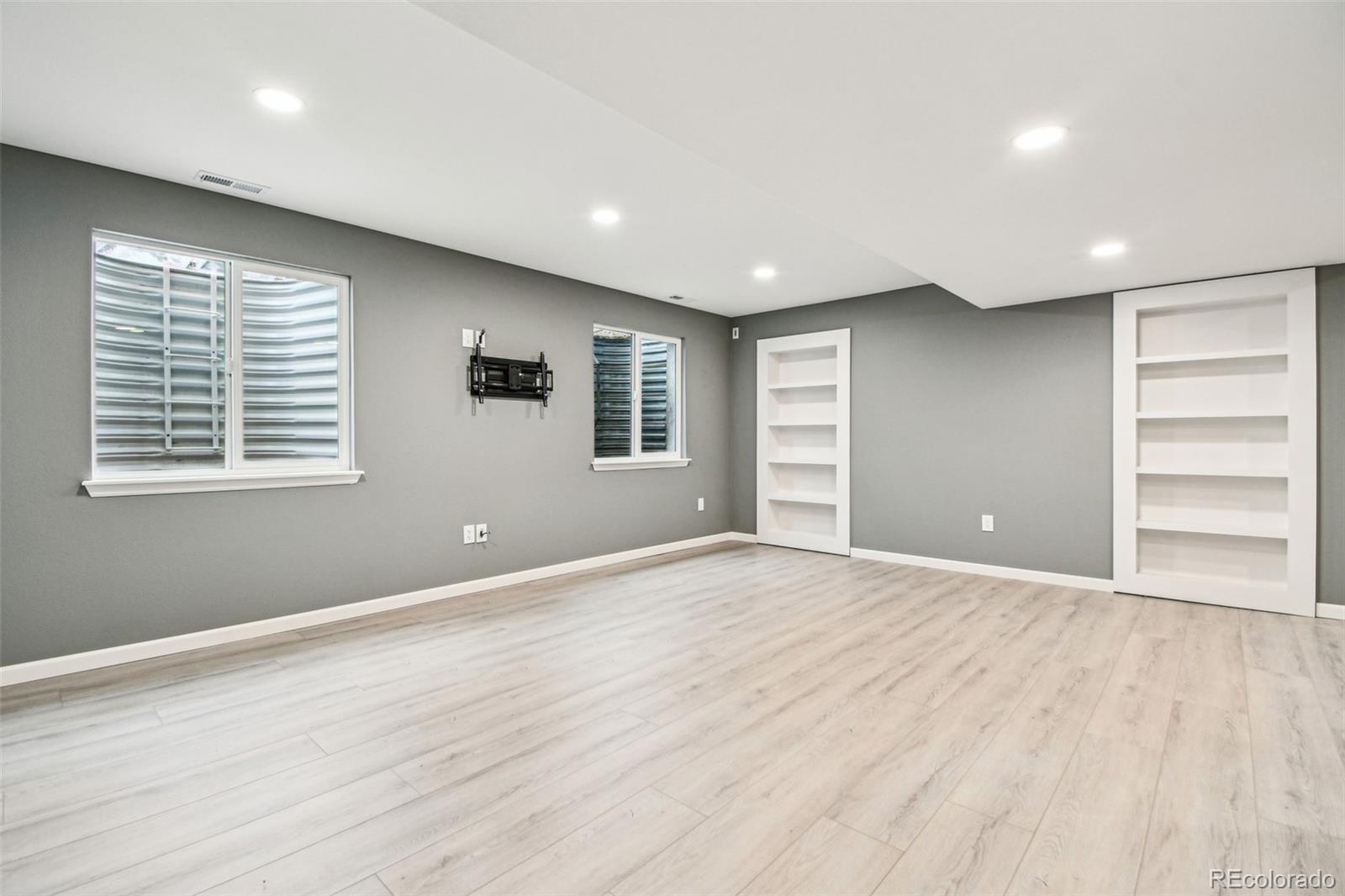 9722 Kipling Street Westminster, CO 80021 - Photo 36 of 45 a view of an empty room with a window