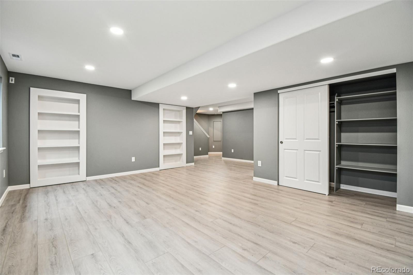 9722 Kipling Street Westminster, CO 80021 - Photo 37 of 45 a view of an empty room with a closet