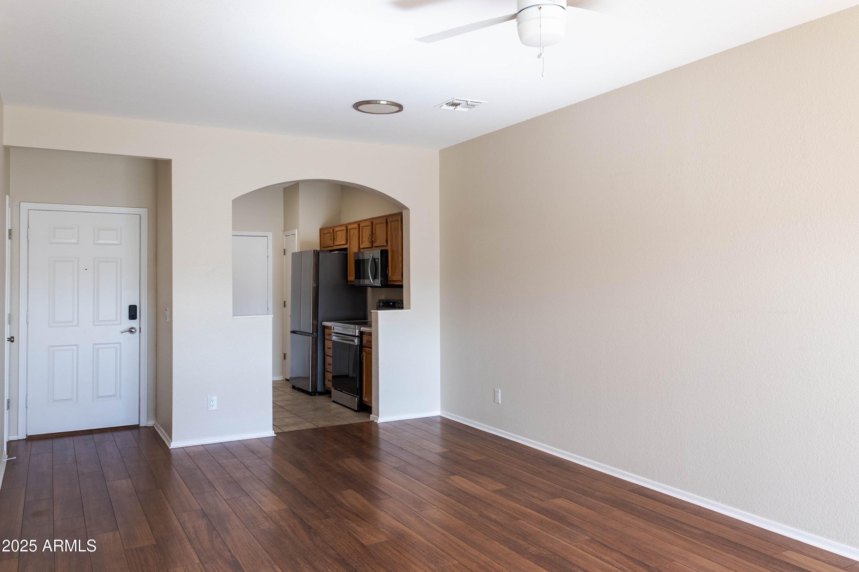 625 North Hamilton Street, Unit 27 Chandler, AZ 85225 - Photo 14 of 40 a view of empty room with wooden floor