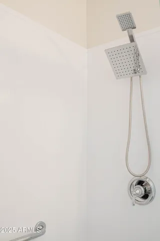 a picture of a wall with a lamp